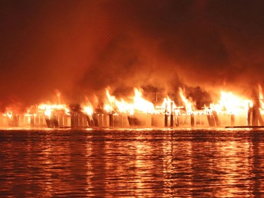 A huge fire destroyed the pier on New Westminster's waterfront. Firefighters from New Westminster, Coquitlam, Delta & Vancouver - including their Fireboats. No reports of injuries or a cause of the fire yet. Photos from the Surrey side of the Fraser River.