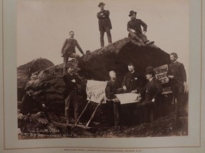 A vintage print of H.T. Devine's famous photo of pioneer Vancouver realtors setting up office in a giant tree stump in May, 1886. The print has resurfaced in The Townley Collection of Early Vancouver, British Columbia and Canadian Pacific Railway Photographs, which is being sold by Wayfarer's Bookshop. The men in the photograph are, from left to right on ground: Edwin Sanders, A.W. Ross, Dr. Fort, J.W. Horne, Mr. Hendrickson, and U.S. Consul Mr. Hemming. Men on log are: H.A. Jones, Mr. Stiles, and an unidentified man. City of Vancouver Archives LGN 454.The Neeland Brothers mounted the print in an album for the print's owner, James Dixon Townley.