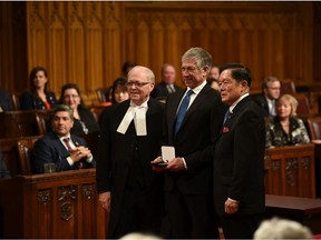 Vancouver immigration lawyer Richard Kurland has made more than 200 presentations in Ottawa, to politicians of all stripes. (Photo: Kurland receives a medal in the Canadian Senate in 2017)