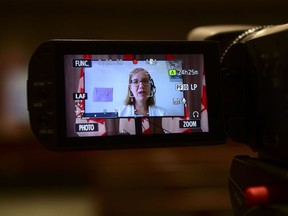 Karina Gould, Minister of International Development, holds a press conference via videoconference on Parliament Hill in Ottawa on Thursday, Aug. 6, 2020. More than 100 Canadian heath and policy experts say the federal government has succumbed to "vaccine nationalism" because it has pre-purchased tens of millions of vaccine doses from private companies.