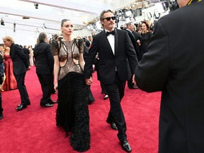 U.S. actor Joaquin Phoenix and Mara Rooney arrive for the 92nd Oscars at the Dolby Theatre in Hollywood, California on February 9, 2020.