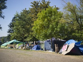 Crime has not gone up in the Strathcona neighbourhood of Vancouver despite a tent city - shown here - that was erected in the summer, according to latest Vancouver Police Department statistics.