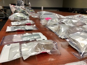 Officers discovered 3.1 kilograms of fentanyl, 225 grams of cocaine, oxycodone pills and over $100,000 in cash at a Surrey home.