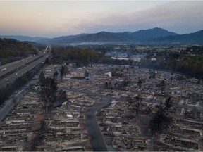 Interstate 5 is seen on the left as the Bear Lakes Estates neighbourhood is left devastated in the aftermath of the Almeda fire in Phoenix, Oregon, on Sept. 9, 2020. Picture taken with a drone.