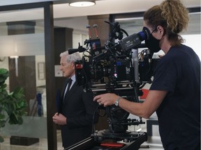 Veteran actor Victor Garber said he was a bit nervous returning to the Vancouver set of Family Law after it was shutdown with the rest of the TV/film production business in March, but the strict and thorough safety and health protocols put him at ease. Garber is seen here on-set with camera operator Caragh Fitzsimmons.