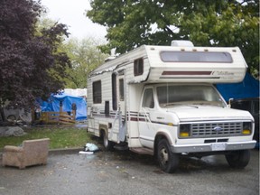 A motorhome parked on Raymur Avenue next to the Strathcona Park encampment.