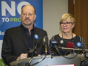 Bill Tieleman shown on the right sitting with Suzanne Anton.