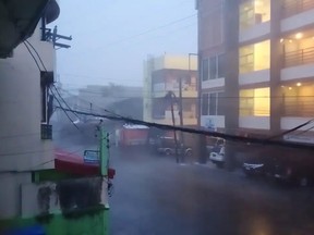 A view of heavy rain during Typhoon Goni in Sorsogon City, Sorsogon, Philippines Nov. 1, 2020 in this still image taken from video obtained from social media.
