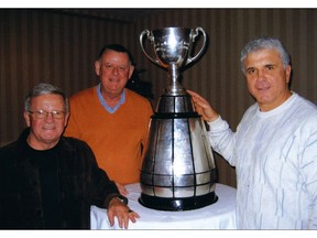 Bobby Ackles, David Braley and Wally Buono with the Grey Cup from November 2006 from Ackles' book Water Boy.