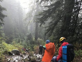 Two hikers were rescued from Grouse Mountain on Sunday afternoon after spending the night lost on the North Shore.