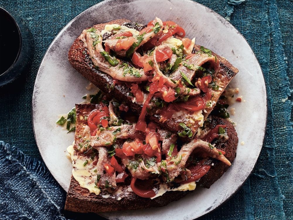  Crunchy tomato, pepper, and anchovy toasts from Cook With Me, by Alex Guarnaschelli.