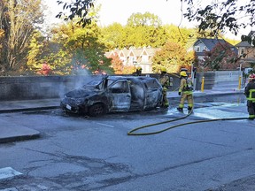 The car on fire was parked at an above-ground lot just outside Vancouver city hall and was reported just after 4 p.m. on Saturday.