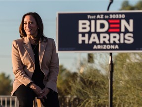 Senator from California and Democratic vice presidential nominee Kamala Harris looks on before speaking during a drive-in campaign rally in Phoenix, Arizona on October 28, 2020.
