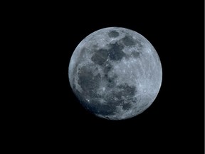This file photo shows a rare full blue moon.