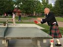 The mayors of Vancouver, Surrey, Richmond, North Vancouver City and Coquitlam all have deep Scottish roots. Photo: Coquitlam Mayor Richard Stewart plays table tennis in the park wearing his family's tartan his checked kilt.
