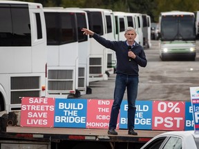 Liberal leader Andrew Wilkinson speaks during a drive-in car rally campaign stop in Delta on Oct. 17.