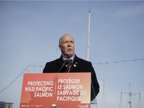 John Horgan makes an announcement about the Salmon Restoration and Innovation Fund during a press conference at Fisherman's Wharf in Victoria, Friday, March 15, 2019. The B.C. NDP leader began the day campaigning in Campbell River, promising action to protect and revitalize wild salmon.