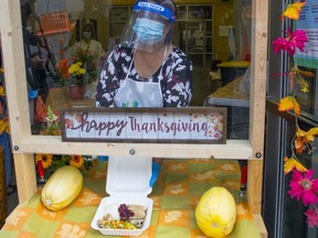 Jennifer Allan, a COVID-19 survivor and formerly homeless woman, gives back by helping serve 1,600 turkey dinners at the Union Gospel Mission.