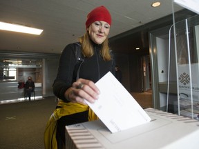 B.C. NDP candidate for Vancouver-False Creek Brenda Bailey votes at a district electoral office in Vancouver on Thursday.