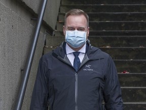 Canada Border Services Agency officer Scott Kirkland leaves B.C. Supreme Court in Vancouver on Thursday, Oct. 29, 2020 after testifying in the Meng Wanzhou extradition hearing.