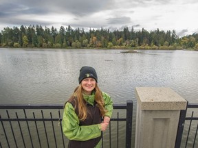 Conservation projects manager Ariane Comeau in front of Lost Lagoon, where more invasive species of fish like carp and three-spined stickleback have been able to survive in warmer water.