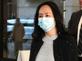 Huawei executive Meng Wanzhou leaves BC Supreme Court in Vancouver, BC., on October 26, 2020.