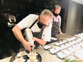 Chef Scott Jaeger (left) making prawn cappuccino with chef Lee Cooper for the No. 1 Gaolers Mews Dinner Series.