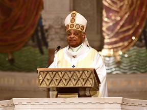 Rev. Wilton D. Gregory, Archbishop of Washington, celebrates an Easter Sunday mass in front of empty pews at the Basilica of the National Shrine of the Immaculate Conception in Washington, D.C. on April 12, 2020.