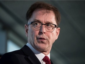 British Columbia Health Minister Adrian Dix responds to questions during a news conference regarding COVID-19, in Vancouver, on Saturday, March 14, 2020.