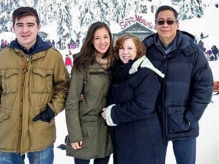  Doug Fung, right, with wife, Bronwyn James (second from right) and children Derek and Jillian, on Grouse Mountain last year.