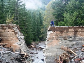 Mark Angelo of the Outdoor Recreation Council sits atop an old dam in the process of being removed on B.C.'s Britannia Creek. The Council is hoping the non-functioning Enloe dam in Washington will meet a similar fate opening up an immense amount of salmon habitat in both Washington and B.C.