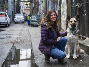 Registered nurse Kelsi Jessamine with her dog Malakai that helps Jessamine in her job at a harm-reduction clinic in Vancouver's Downtown Eastside.