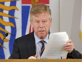 The Honourable Justice Austin F. Cullen makes opening statements at the Cullen Commission into money laundering in B.C.