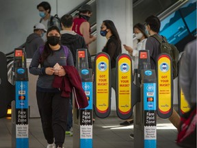 People come and go from Broadway Skytrain and bus station in Vancouver, B.C., August 24, 2020.