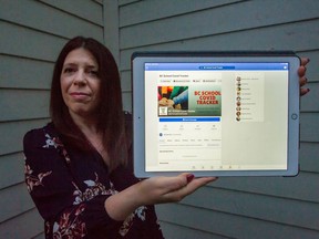 Kathy Marliss with her iPad showing her Facebook page. Marliss operates the Facebook page B.C. School COVID tracker, which collates all the known school cases and outbreaks in the province.