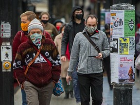 Almost all commuters were wearing masks near the Commercial and Broadway SkyTrain station in Vancouver on Monday.