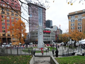 Participants in the 2020 Remembrance Day ceremony at the Cenotaph at Victory Square, in Vancouver, BC., on November 11, 2020.  The event was scaled down due to Covid-19 restriction with the public asked to stay away.(NICK PROCAYLO/PNG) 



00062959A ORG XMIT: 00062959A [PNG Merlin Archive]