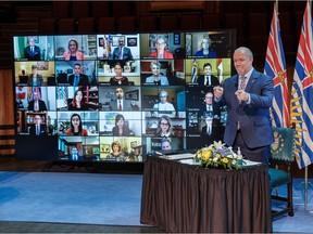 Premier John Horgan's new cabinet, seen here in a virtual swearing in ceremony Nov. 26, has had little time to prepare for the new legislative session beginning Dec. 7.
