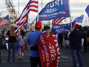 Supporters of U.S. President Donald Trump gather at a "Stop the Steal" protest after the 2020 U.S. presidential election was called for former vice-president Joe Biden, in front of the Arizona State Capitol in Phoenix, Arizona, U.S., November 8, 2020.