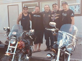 Surrey Police Board member Harley Chappell, left, posed with two members of the White Rock Hells Angels, Douglas (Doc) Riddoch, centre, and Brent Milne, second from right, at an August 2018 memorial service.