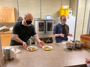 Principal Chris Lekakis helping to serve breakfast in Pender Harbour Elementary- Secondary school.