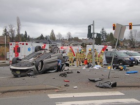 A horrific rollover crash in Coquitlam landed one car on its roof and another in the ditch on Sunday morning.