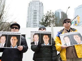 Protesters in Vancouver call for the release of Canadians Michael Spavor and Michael Kovrig, who have been detained in China for two years.