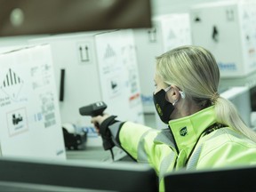 UPS Canada tweeted on Saturday the first images of the Pfizer vaccine being processed in Cologne, Germany for delivery to select sites in Canada this week.