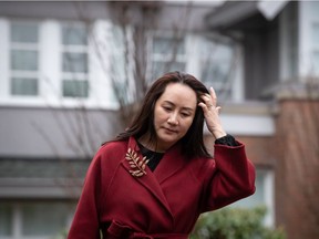 Meng Wanzhou, chief financial officer of Huawei, leaves her home to attend a hearing at B.C. Supreme Court, in Vancouver, on Friday, December 11, 2020.