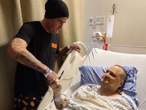 Skully White (left), owner of Lullys Food Experience, donated his kidney to customer Tim Hiscock on Monday.