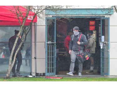 PORT COQUITLAM, December 7, 2020 -- Police on scene following a shooting at West Coast Iron gym at 1533 Broadway St , in  Port Coquitlam, BC., on December 7, 2020. (NICK PROCAYLO/PNG) 



00063224A ORG XMIT: 00063224A [PNG Merlin Archive]