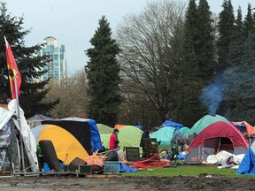 Mid-December scenes from Strathcona Park in Vancouver. The city's homeless crisis has become a political funding controversy between the provincial and federal governments.