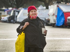 Claudette Abraham stands near the Strathcona tent city in Vancouver.