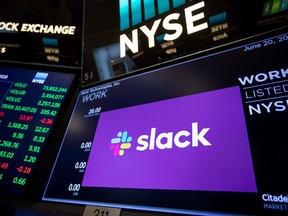 A monitor displays Slack Technologies Inc. signage during the company's initial public offering on the floor of the New York Stock Exchange in New York, U.S., on Thursday, June 20, 2019.